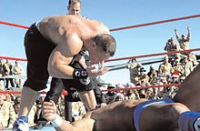 Cena's delivers his signature taunt, "U ₡ ME", to Chris Masters.