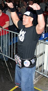 Cena, wearing his customized U.S. Championship belt