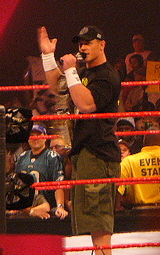 Cena, addressing fans at a Raw show