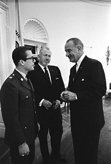 John Steinbeck, with his 19-year-old son John (left), visits his friend, President Johnson, in the Oval Office, May 16, 1966. John Jr. is shortly to leave for active duty in Vietnam.