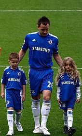 John Terry with mascot children