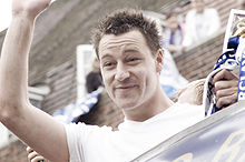 John Terry celebrating after the win of the 2006 Premier league trophy