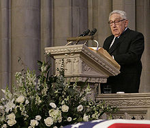 Kissinger speaking during Gerald Ford's funeral in January 2007.