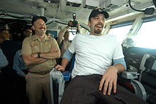 Affleck aboard USS Enterprise (CVN-65) on a USO sponsored tour of the Persian Gulf in December 2003