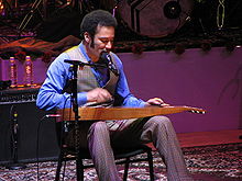 Harper playing the weissenborn in Massey Hall, Toronto, Ontario.