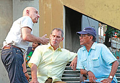 Kingsley (left) with Ben Cross (centre) and Chandran Rutnam (right) at Fort Railway Station in Sri Lanka, during shooting of the Rutnam-directed film A Common Man.