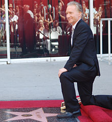 Maher next to his star on the Hollywood Walk of Fame in September 2010