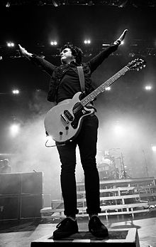 Armstrong performing at the Fox Theatre in March 2013 during Green Day's first show since Armstrong left rehab.