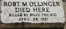 A grave marker indicating that the deceased was killed by Billy the Kid