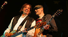 Corgan has collaborated with several acts since reforming The Smashing Pumpkins; he is pictured here performing with the late Mark Tulin of The Electric Prunes at a benefit concert for Sky Saxon.