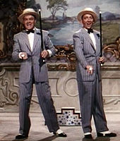 Bob Hope and Bing Crosby sing and dance during "Chicago Style" in Road to Bali (1952)