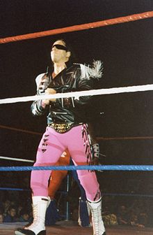 Hart with his WWF Championship underneath his jacket.