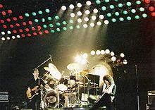May (right) on stage with Queen in 1979.