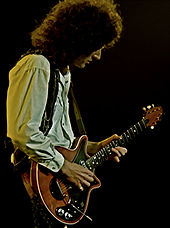 May playing his signature Red Special guitar, which contributed an essential part of Queen's sound