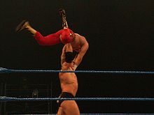 Lesnar demonstrating his strength during a Smackdown taping in February 2004.