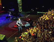 An acoustic guitar number during the solo Devils & Dust Tour performance at the Festhalle Frankfurt, June 15, 2005.