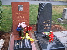 Bruce Lee is buried next to his son Brandon in Lakeview Cemetery, Seattle.