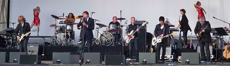 Bryan Ferry onstage at Guilfest 2012, with backing from Johnny Marr and Chris Spedding.