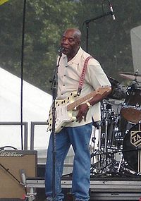 Guy performing at the Bonnaroo Music Festival in 2006.