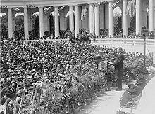 Coolidge addressing a crowd at Arlington National Cemetery's Roman style Memorial Amphitheater in 1924.