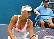 Caroline Wozniacki serving in the New Haven Open