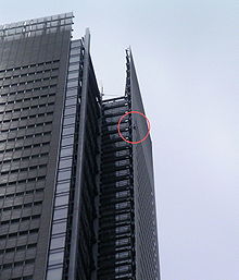 Alain Robert climbing the New York Times Building on June 5, 2008. Circle has been added to highlight Robert's location.
