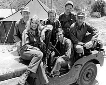 The cast of M*A*S*H from Season 2, 1974 (clockwise from left): Loretta Swit, Larry Linville, Wayne Rogers, Gary Burghoff, McLean Stevenson, and Alda