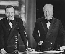 Chaplin (right) receiving his Honorary Academy Award from Jack Lemmon in 1972. It was the first time he had returned to the United States in 20 years.