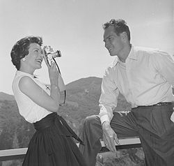 Heston poses for his wife Lydia at their hilltop Beverly Hills home, just after winning an Oscar for his role in Ben-Hur, 1960.