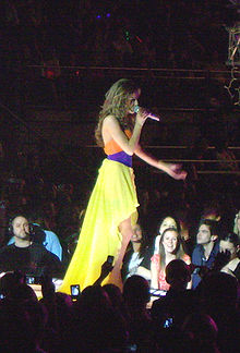 Cole performing with Girls Aloud at the O2 arena in 2008