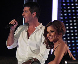 Cole alongside Simon Cowell on The X Factor