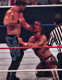 Jericho attacking Shawn Michaels' injured eye at The Great American Bash during their Feud of the Year rivalry.
