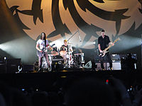 Cornell, Cameron and Shepherd performing with Soundgarden at Lollapalooza 2010.