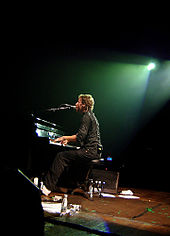 Martin playing "Trouble" on his piano during a concert in Brazil, February 2007