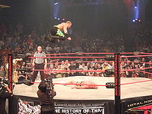 Reso performing a frog splash on Kurt Angle in Total Nonstop Action Wrestling (TNA)