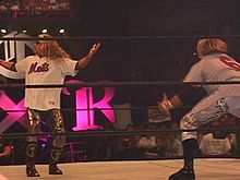 Christian (right) and Edge at King of the Ring 2000 performing a five second pose.