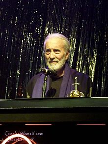 Lee receiving the "Spirit of Metal" award for his album Charlemagne: By the Sword and the Cross at the 2010 Metal Hammer Golden Gods ceremony