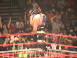 Daniels performing a Best Moonsault Ever on Shane Douglas