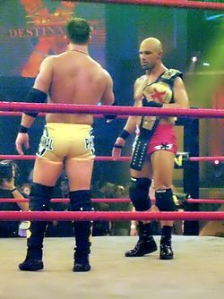 Daniels with AJ Styles at Destination X in 2006, after winning the X Division Championship.