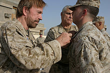 Norris during a promotion ceremony at Camp Taqaddum in the Al Anbar province of Iraq on November 2, 2006