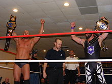Swiss Money Holding(Castagnoli and Ares) as the Chikara Campeones de Parejas in October 2010.
