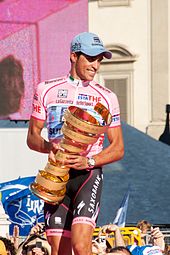 Contador in maglia rosa in Milan celebrates victory at 2011 Giro d'Italia. He was later stripped of this title.