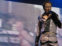 O'Brien performing in a replica of the costume Eddie Murphy wore in Eddie Murphy Raw.