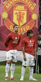 Ronaldo (left) and Carlos Tévez prior to a Champions League match.