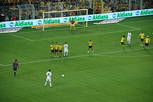Ronaldo taking a free kick for Real Madrid against Borussia Dortmund at Signal Iduna Park.