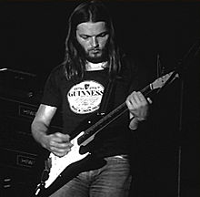 Gilmour performing with Pink Floyd in the early 1970s