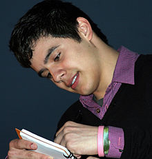 Archuleta signs autographs while serving as Grand Marshal at the Krewe of Caesar Mardi Gras parade in Metairie, Louisiana, on Valentine's Day, 2009.