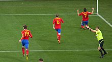 David Villa celebrating his goal against Portugal along with team-mates Fernando Llorente and Andrés Iniesta.