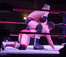McGuinness performing the London Dungeon on Joel Redman in 2011.